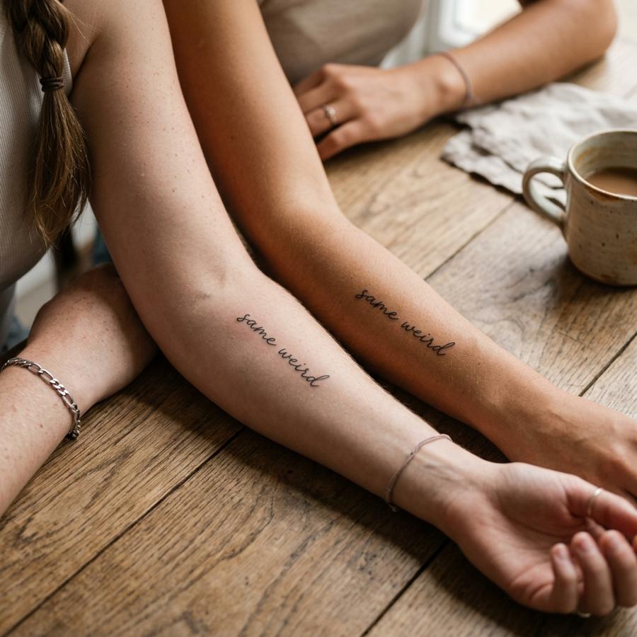 Same Weird Script tattoo idea for women